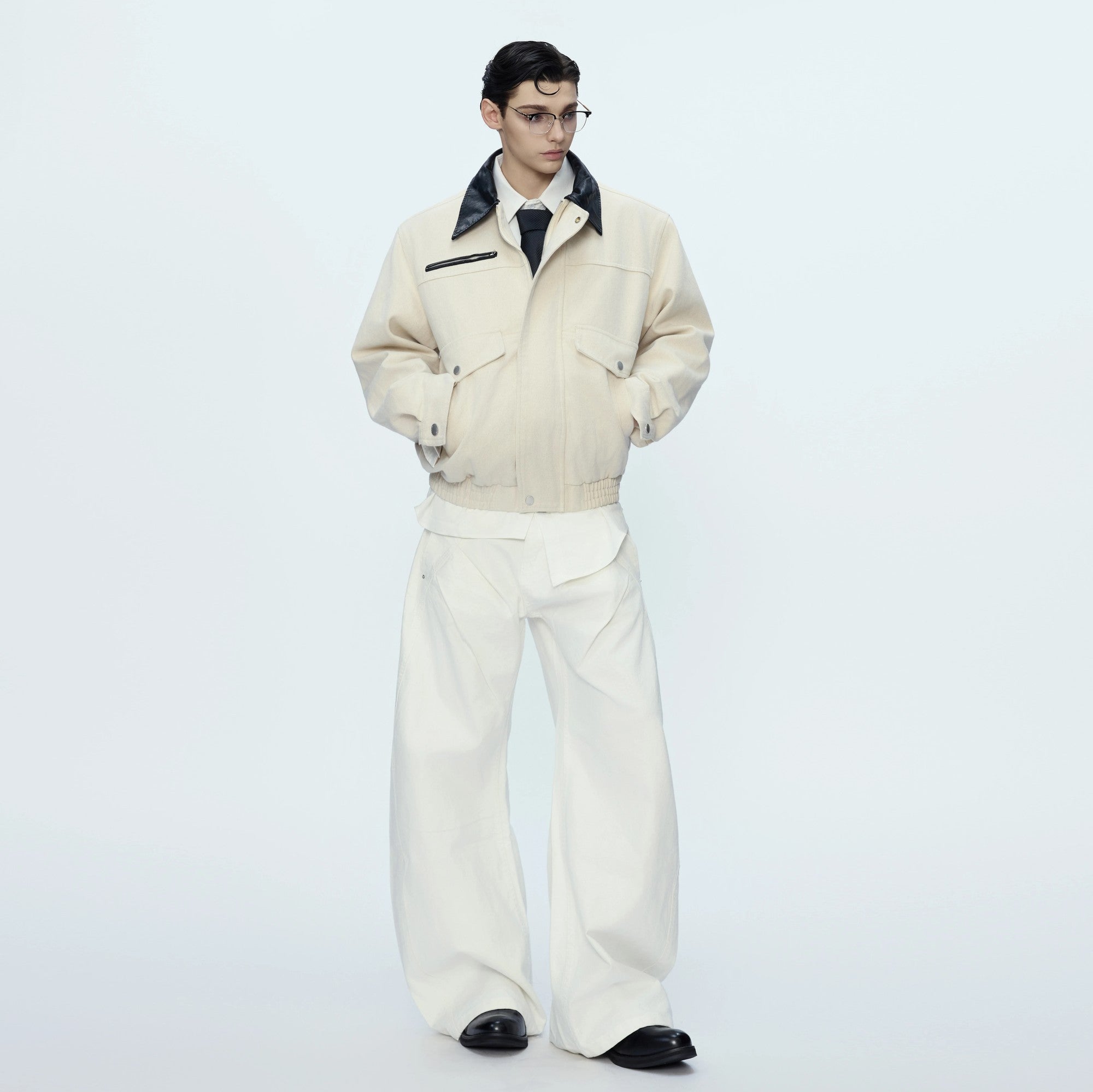 Detailed view of the large 3D patch pockets on the cotton jacket