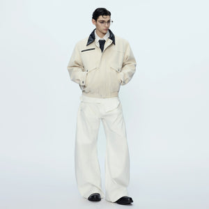 Detailed view of the large 3D patch pockets on the cotton jacket