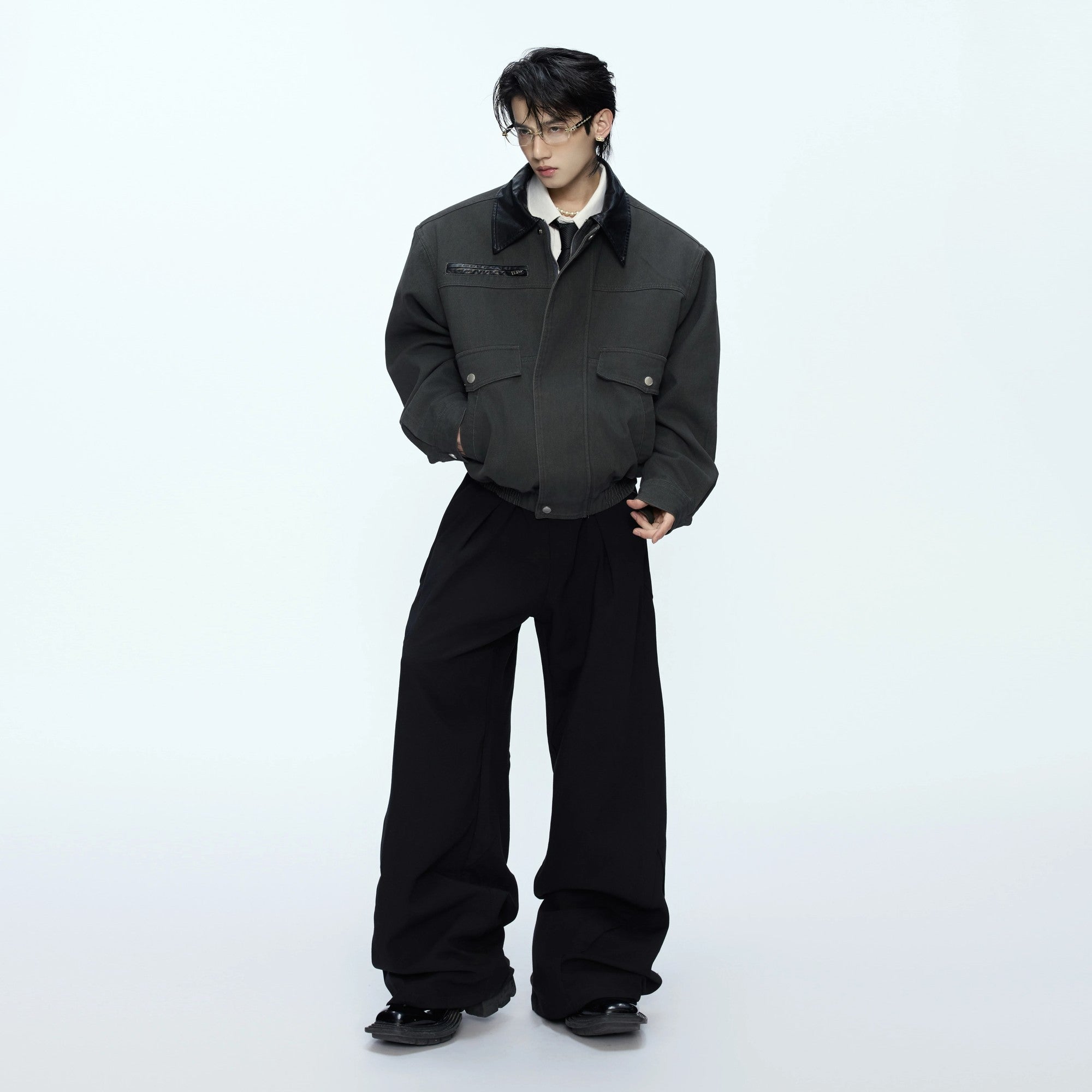 Model wearing the apricot workwear jacket in a street setting