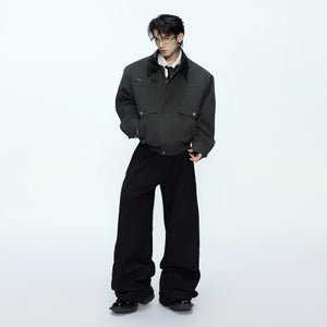 Model wearing the apricot workwear jacket in a street setting