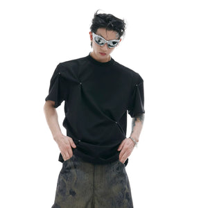 Back view of the structured shoulder design on a black pleated cotton tee