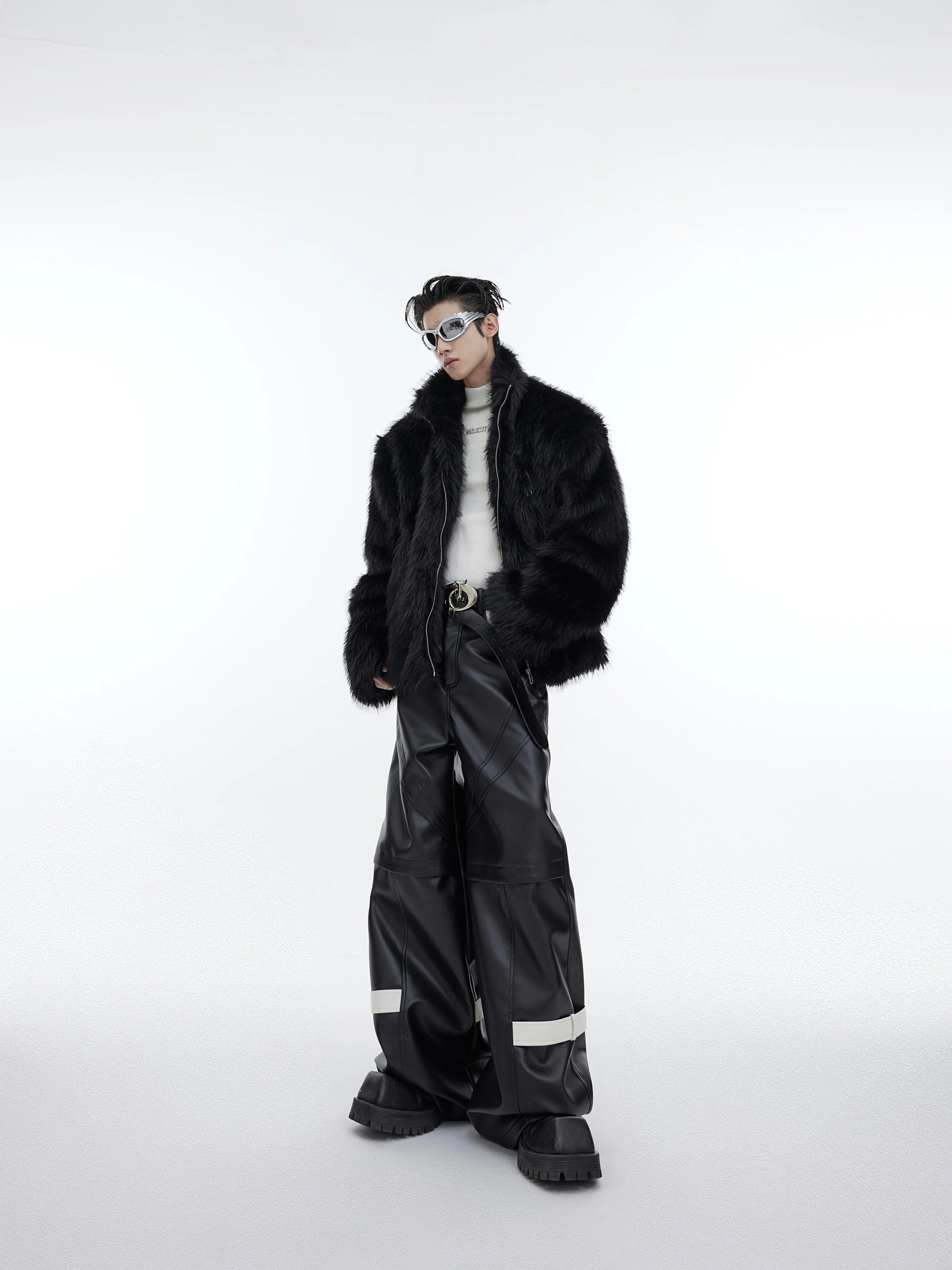 Lifestyle shot of the faux mink fur jacket styled with baggy cargo pants.