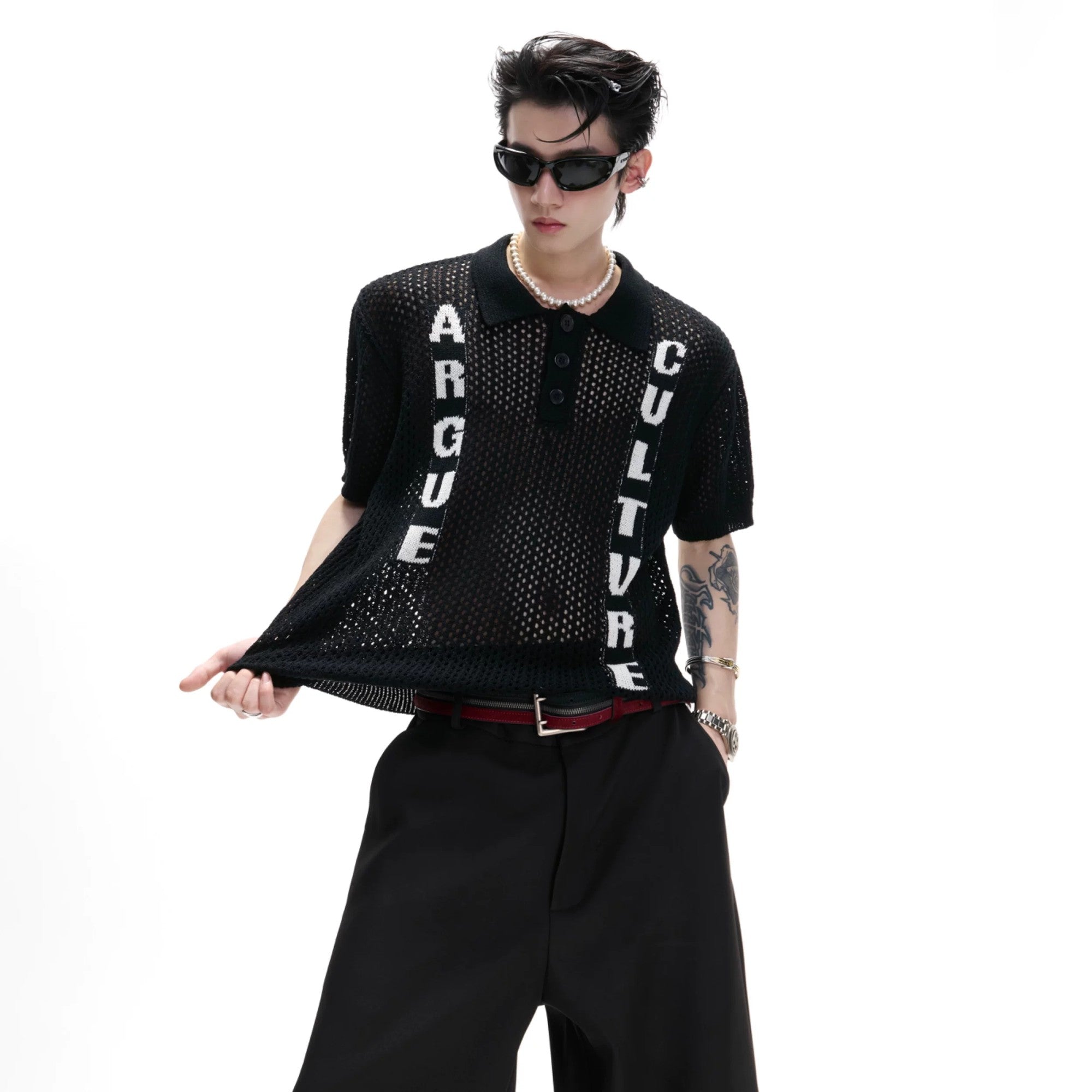 Street style model wearing boxy open-knit polo shirt