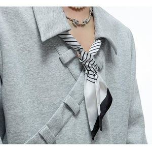 desc::boxy-v-neck-polo-sweatshirt-with-detachable-scarf-detail-img-9