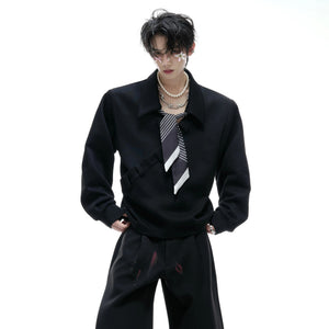 Black V-neck polo sweatshirt with striped silk scarf detail
