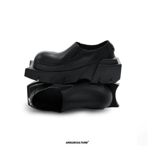 Side profile of techwear inspired leather shoes with armor detailing