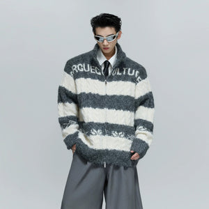 Close-up of the heavyweight wool blend chunky knit fabric texture.