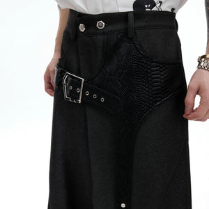 Street style outfit featuring croc-skin patchwork trousers and combat boots.