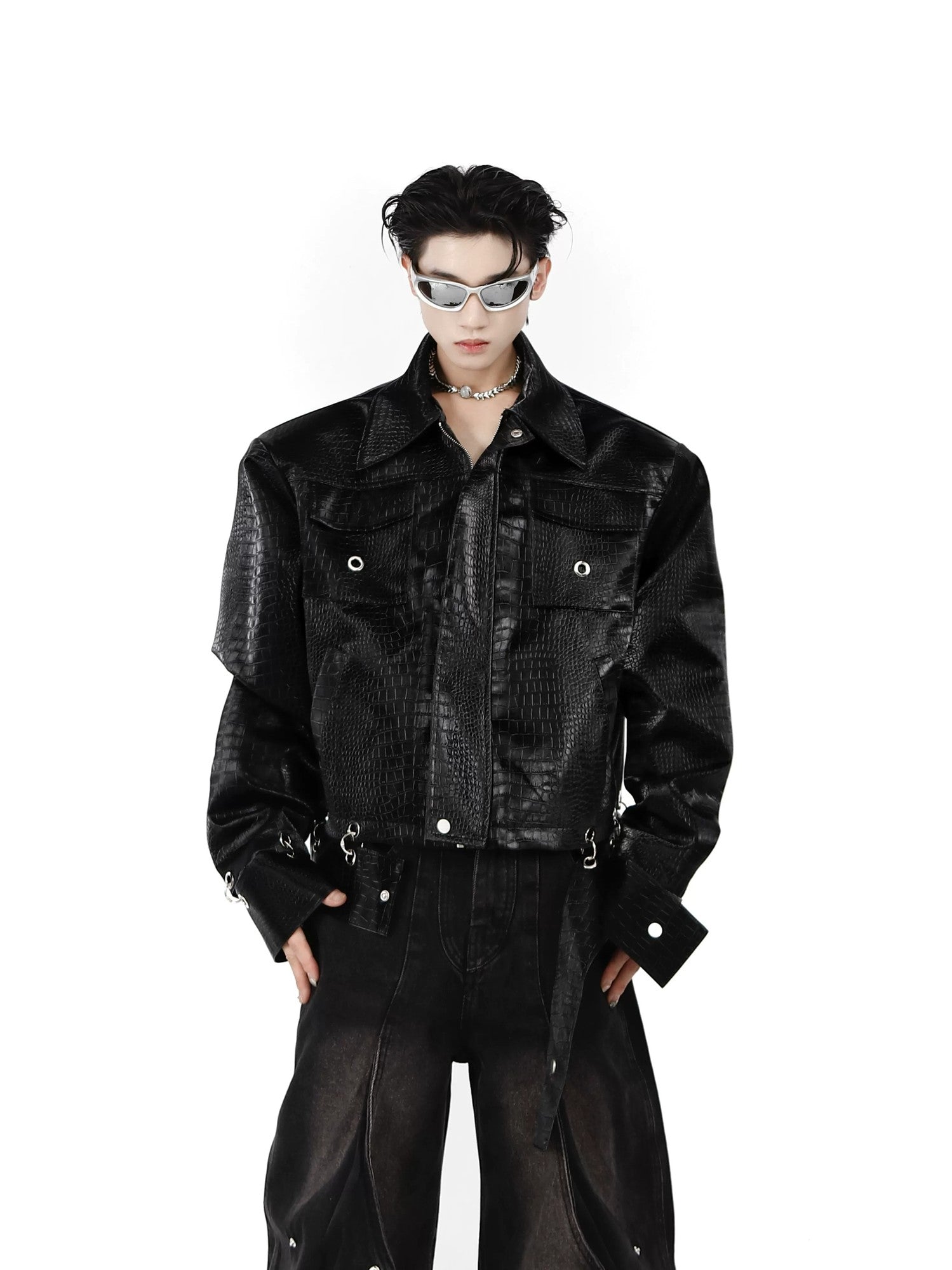 Front view of black crocodile embossed PU leather jacket with spliced design