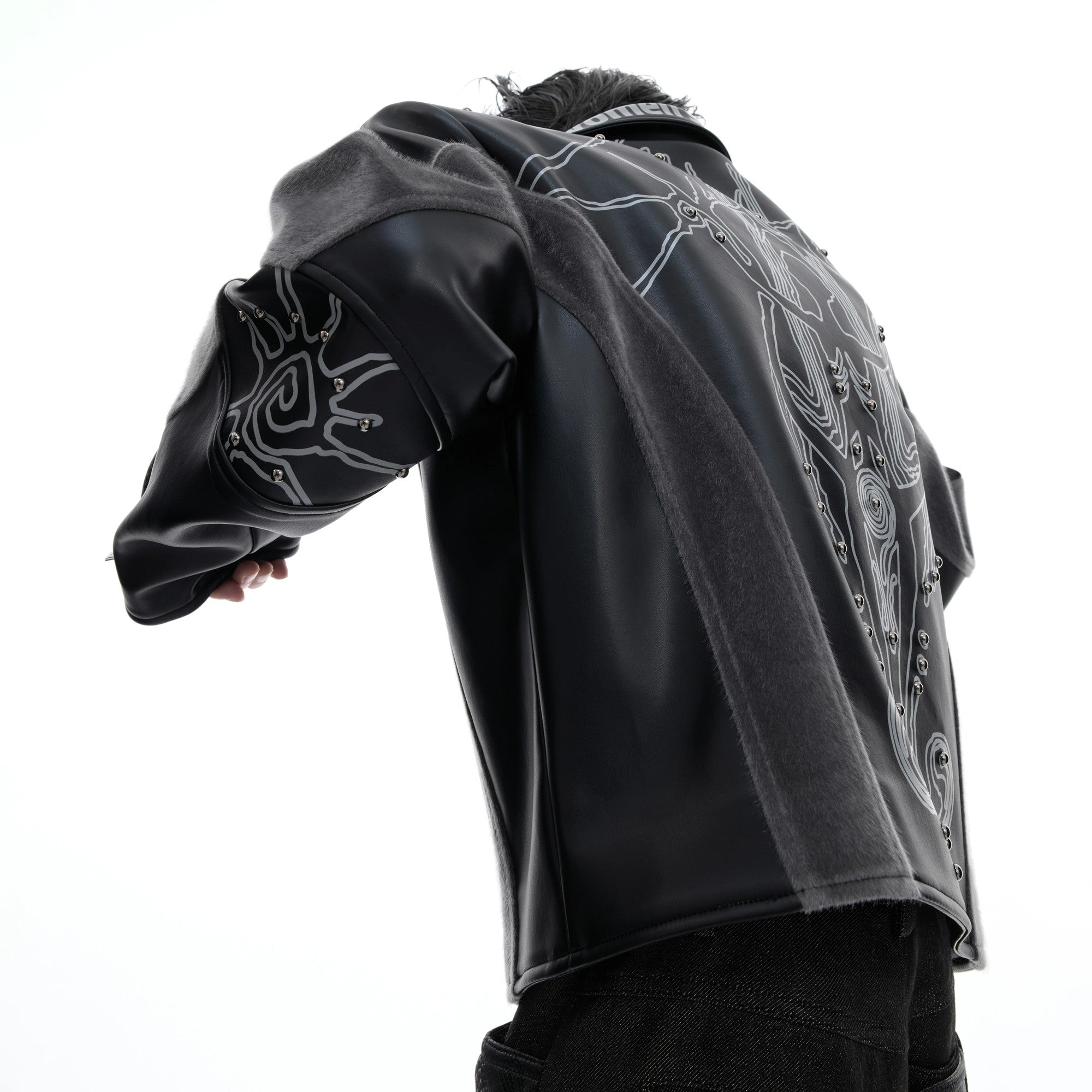 Back view showing large totem graphic and rivet details