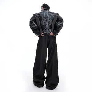 Model wearing cropped gothic leather jacket in urban setting