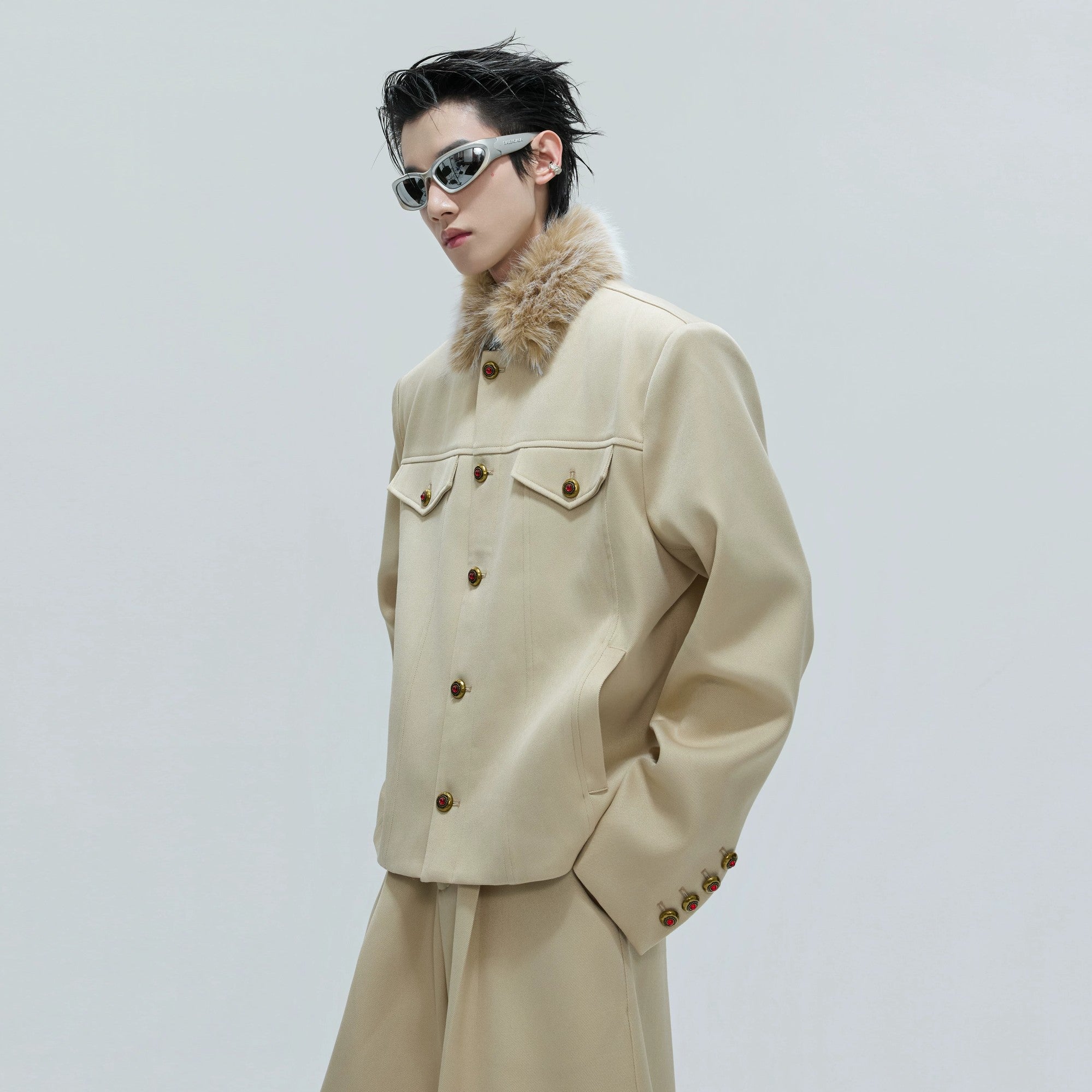 Back view of the loose fit cropped jacket set for men and women