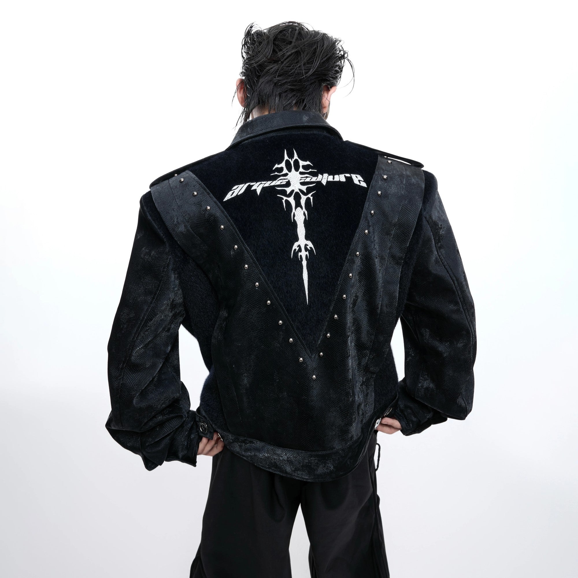 Front view of black heavy studded snakeskin leather cropped jacket