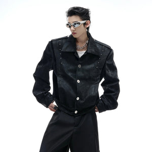 Back view showing intricate thorn embroidery and silver studs