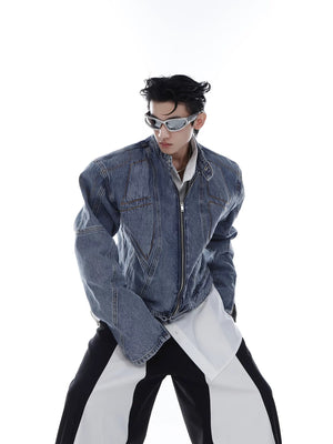 Close-up of deconstructed design and ribbed hem on denim jacket