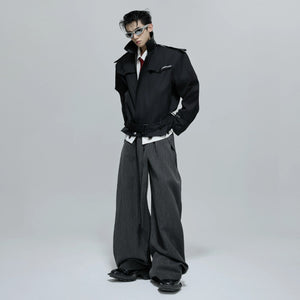 Model wearing the red khaki patchwork jacket in an urban street setting.