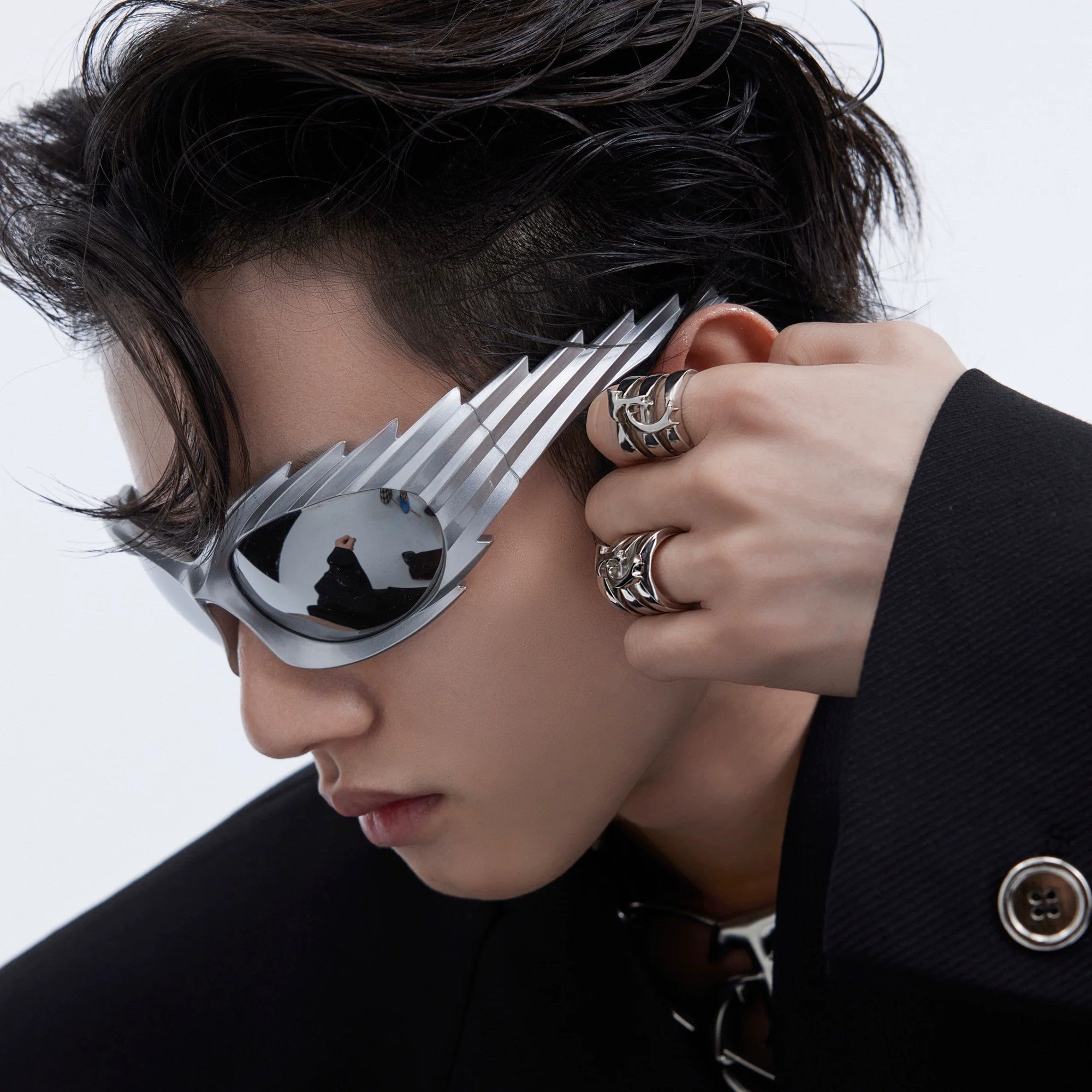 Detailed shot of the deconstructed Ouroboros triple ring design.