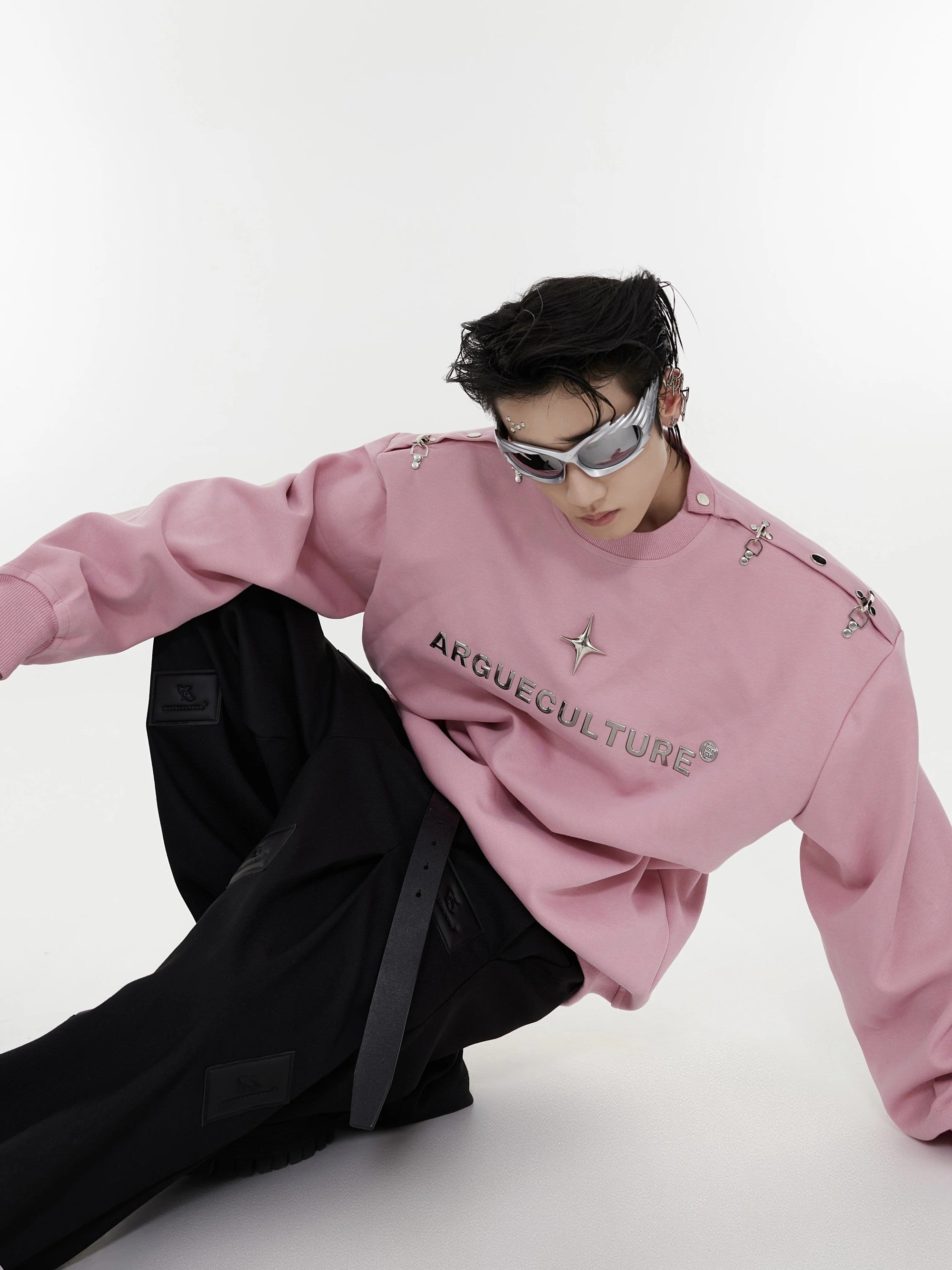 Black oversized streetwear pullover featuring structured shoulders