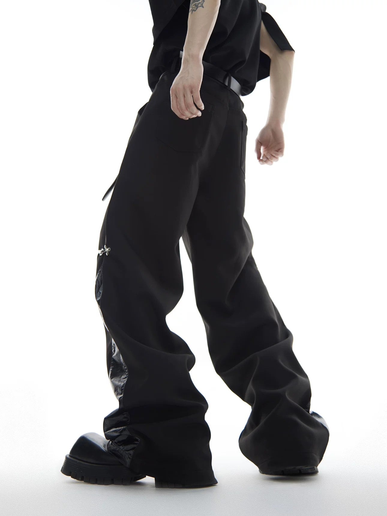 Back view of high-waist punk streetwear trousers in black