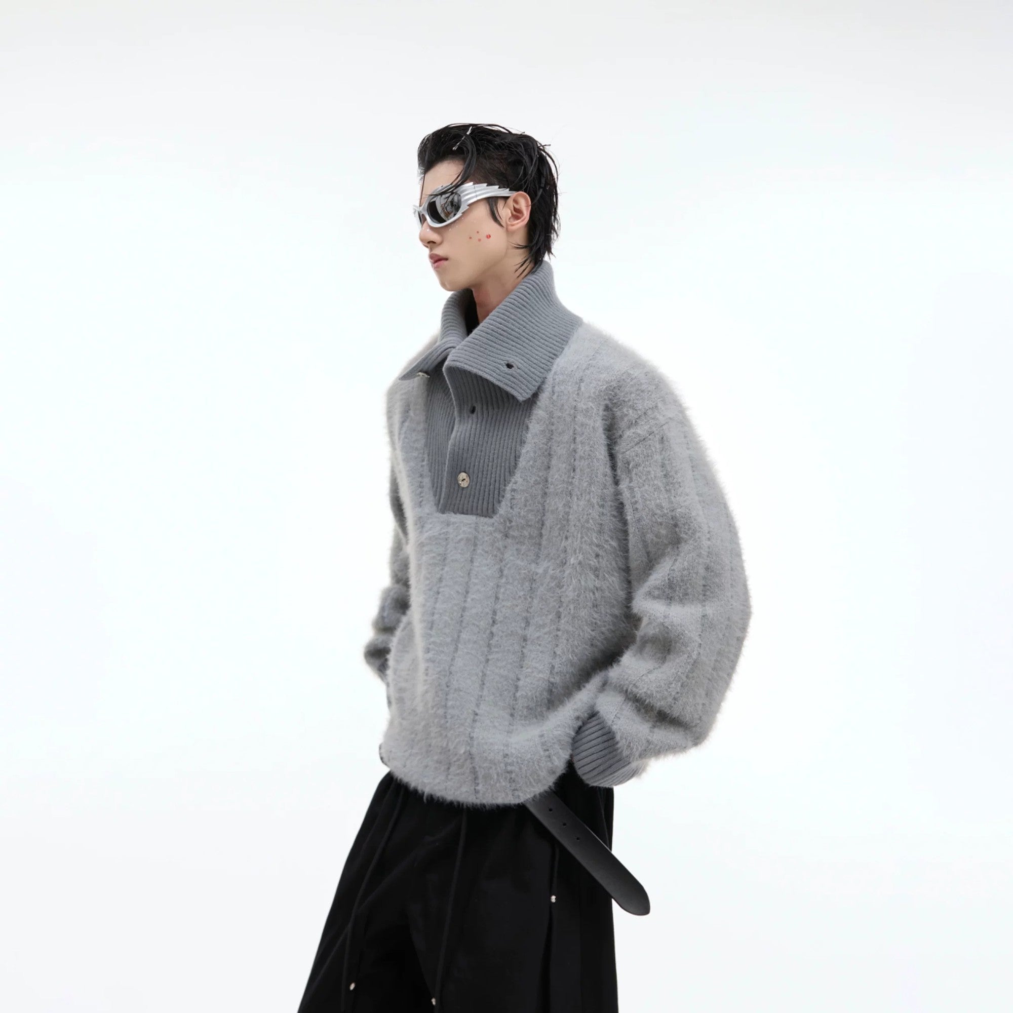 Front view of a gray deconstructed button turtleneck knit sweater