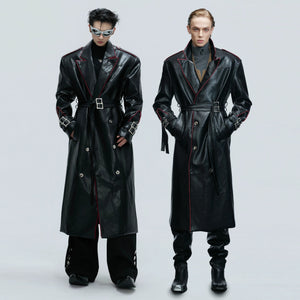 Front view of a deconstructed black croc-effect leather long coat with wide shoulders