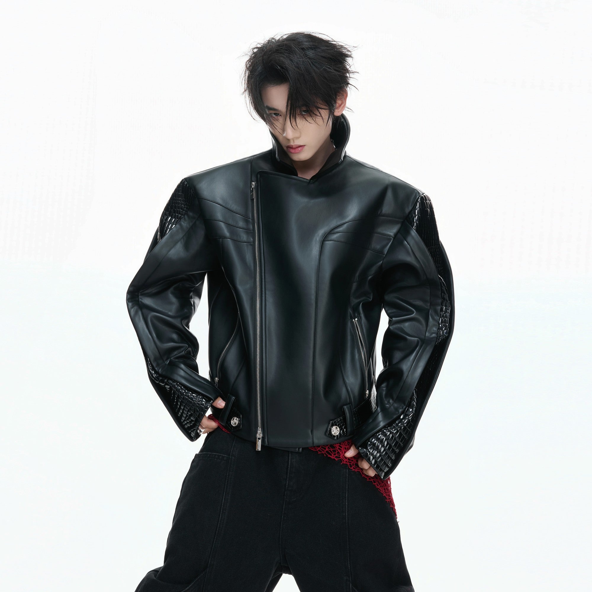 Front view of deconstructed crocodile embossed leather jacket in matte black