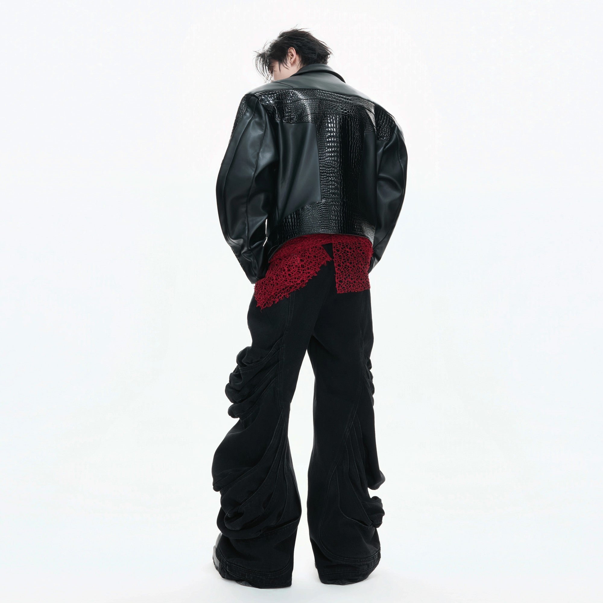 Street style shot of the croc embossed moto jacket with cargo pants