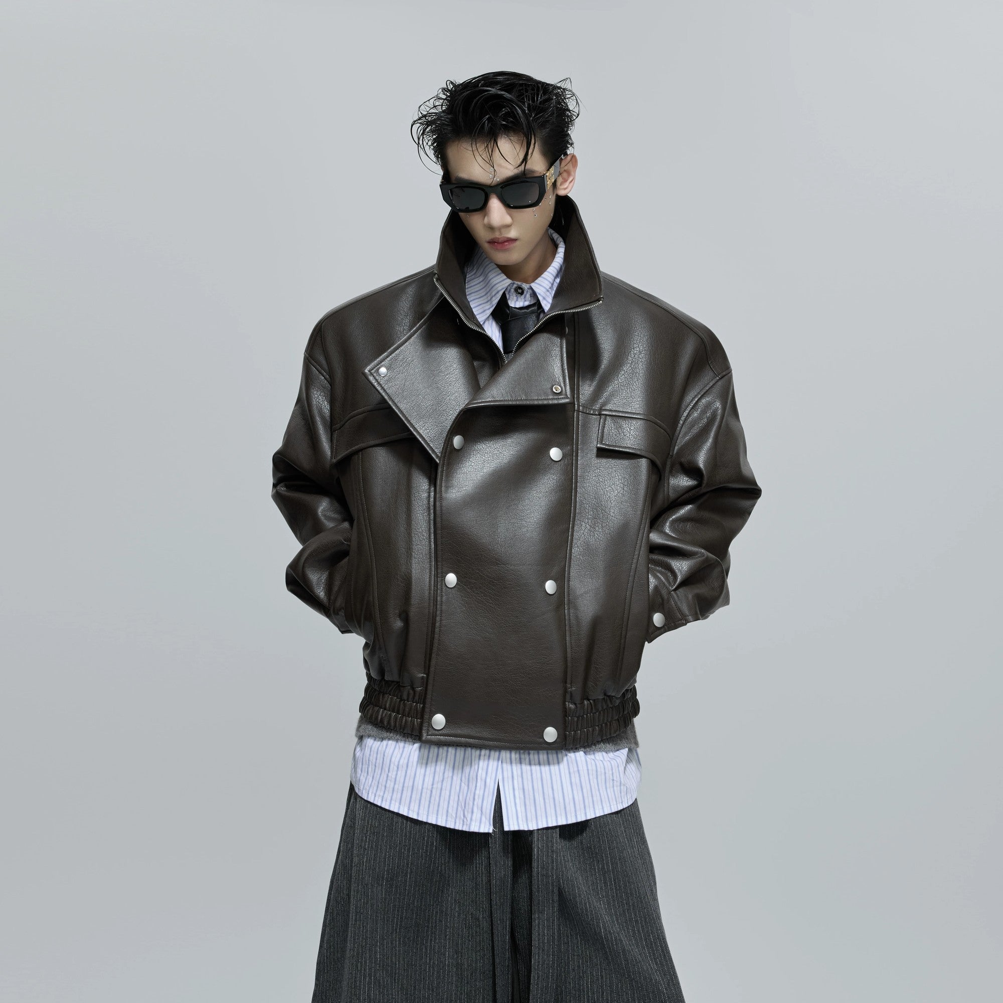 Streetwear style red faux leather jacket with deconstructed layers