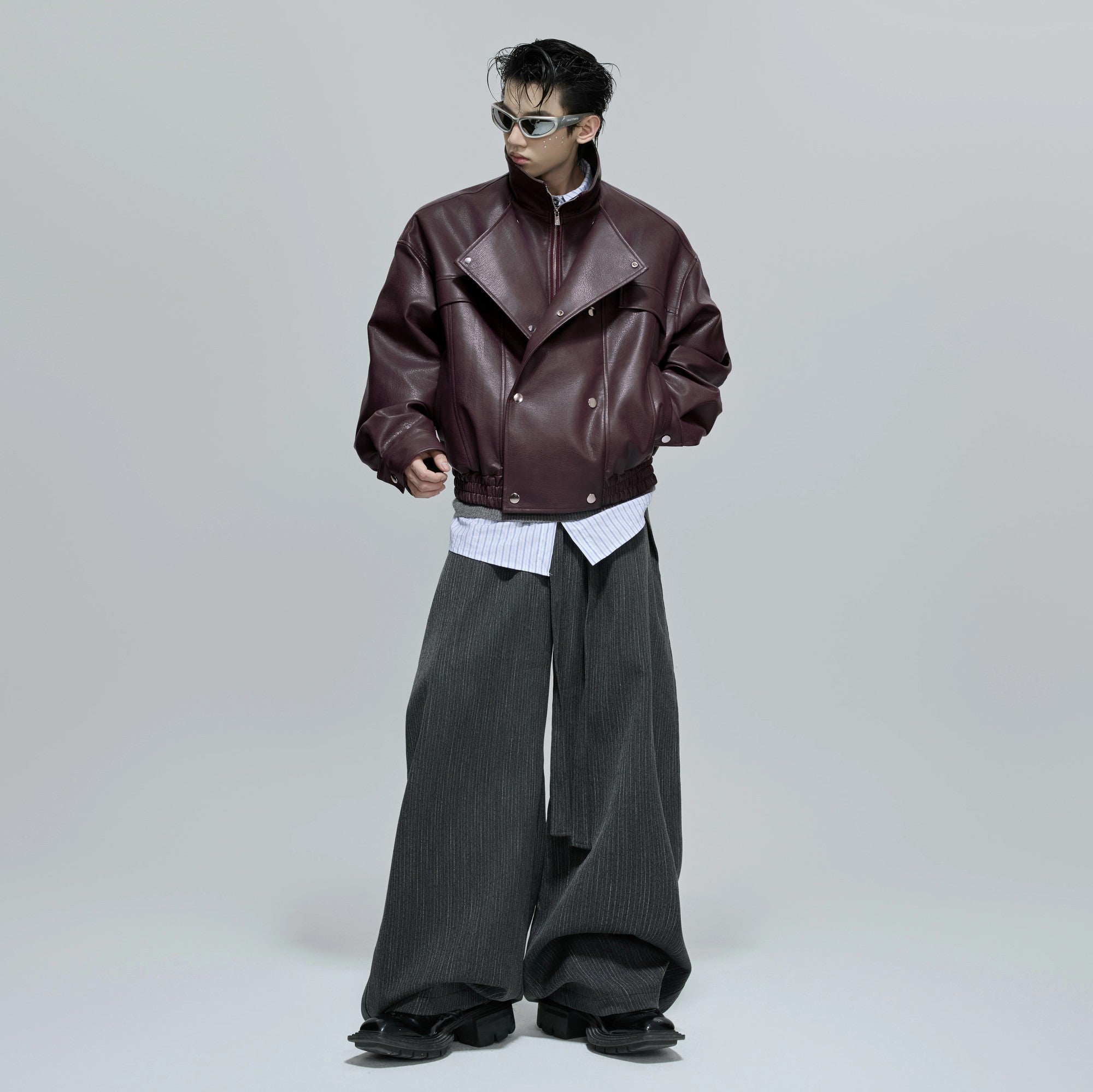 Back view showing the elastic hem and boxy silhouette