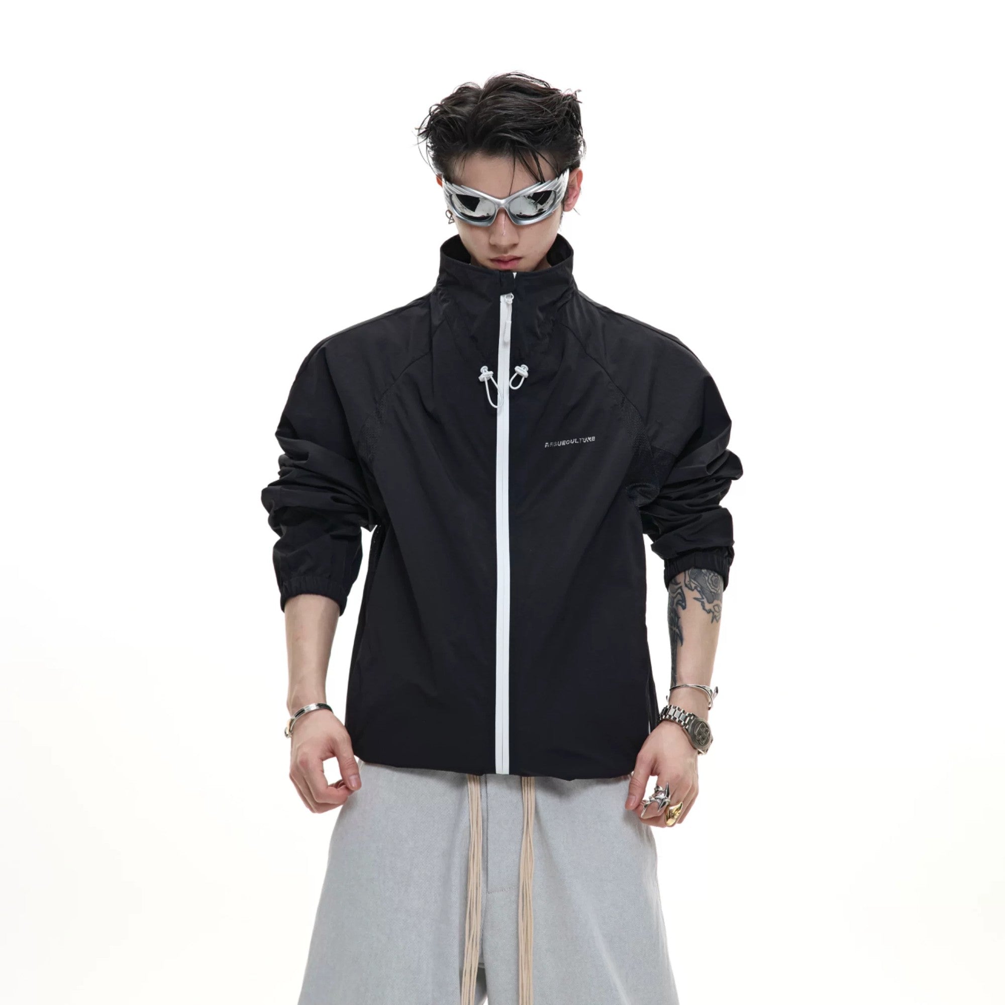 Front view of black deconstructed cropped sun protection jacket