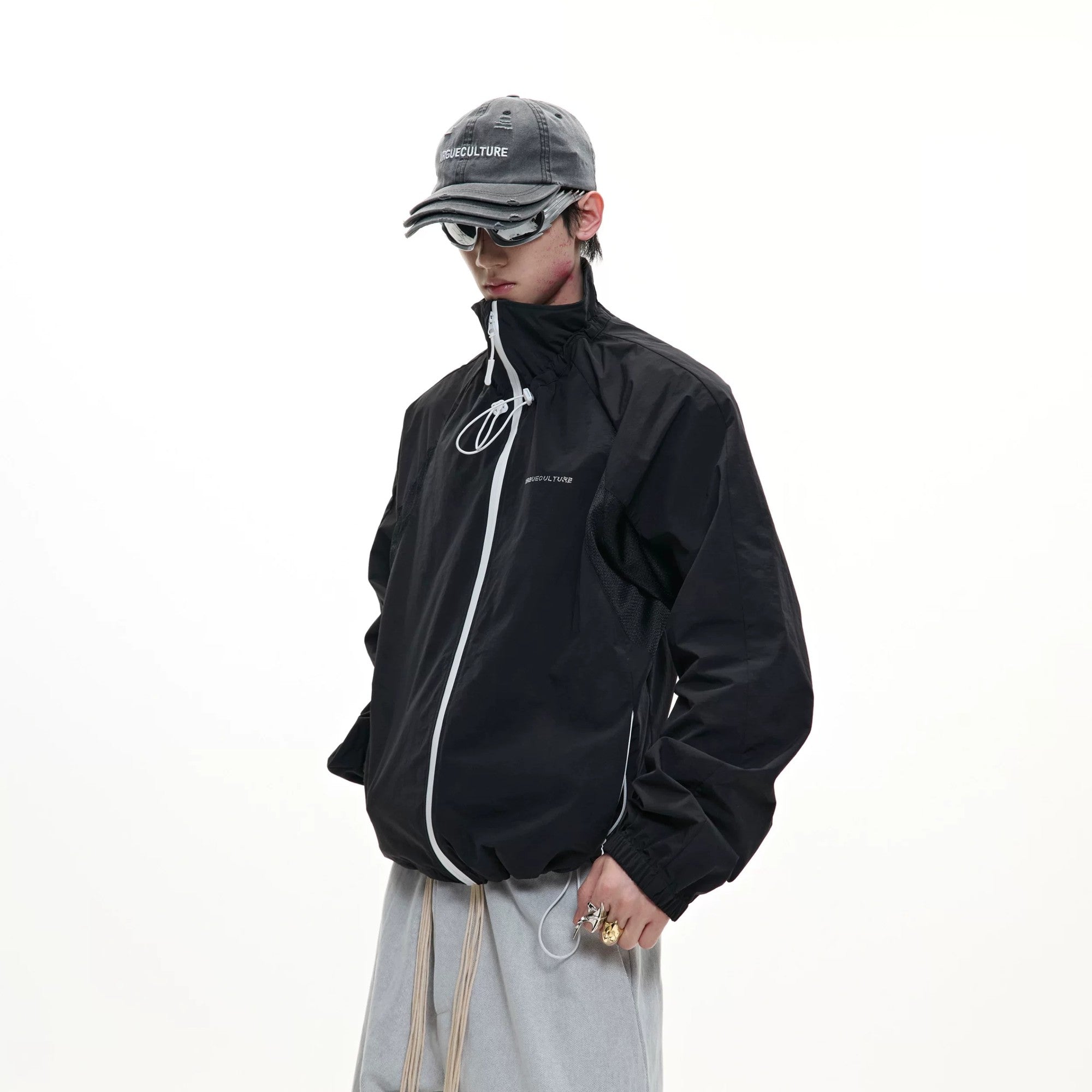 Back view showing breathable mesh panels and ribbed hem
