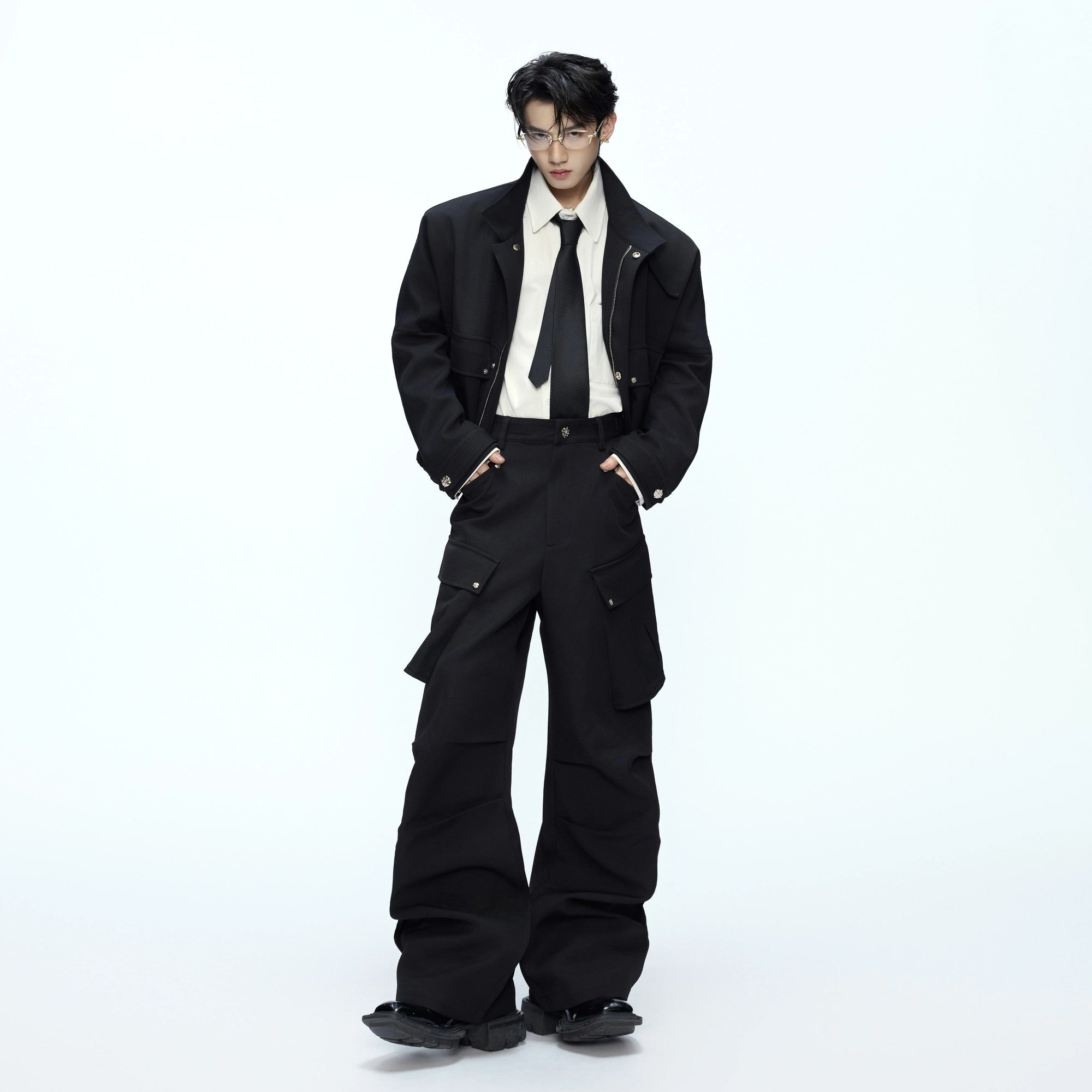 Premium cotton cargo pants with deconstructed utility pocket details