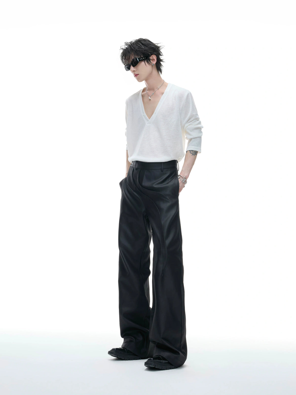 Deconstructed Curved-Wave Flared Trousers in Black - main image 4