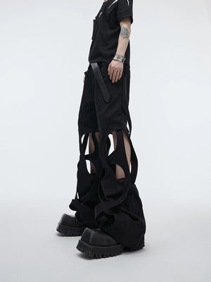 Front view of black deconstructed cut-out streetwear cargo pants