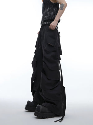 Back view of loose fit flare cargo pants with ribbon accents
