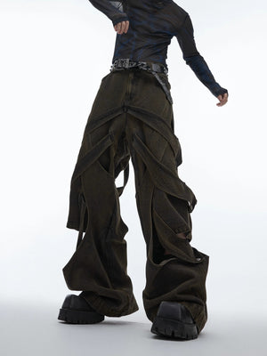 Flatlay of black deconstructed distressed denim cargo pants