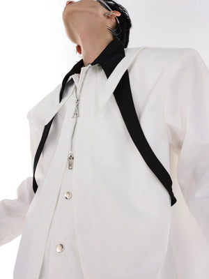 Close-up of the deconstructed collar and tie design on streetwear shirt