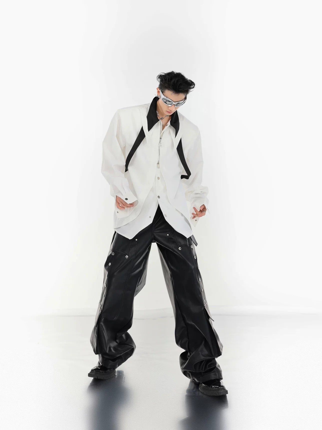 Deconstructed shirt showcasing the unique curved placket and contrast details