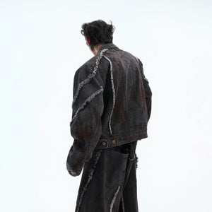 Back view of the gradient wash effect on the denim streetwear outfit.