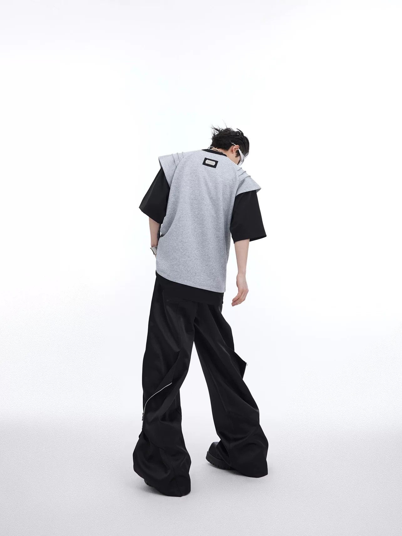 Flatlay of the ink splatter designer t-shirt showing construction
