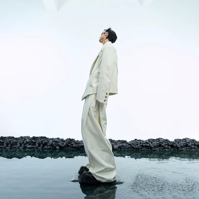 Wide-leg trousers with pleated details from the deconstructed set