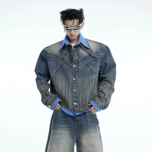 Detail shot of whiskered blue straight leg denim pants for men.