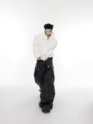 Model wearing deconstructed liquid metal jacket in urban environment