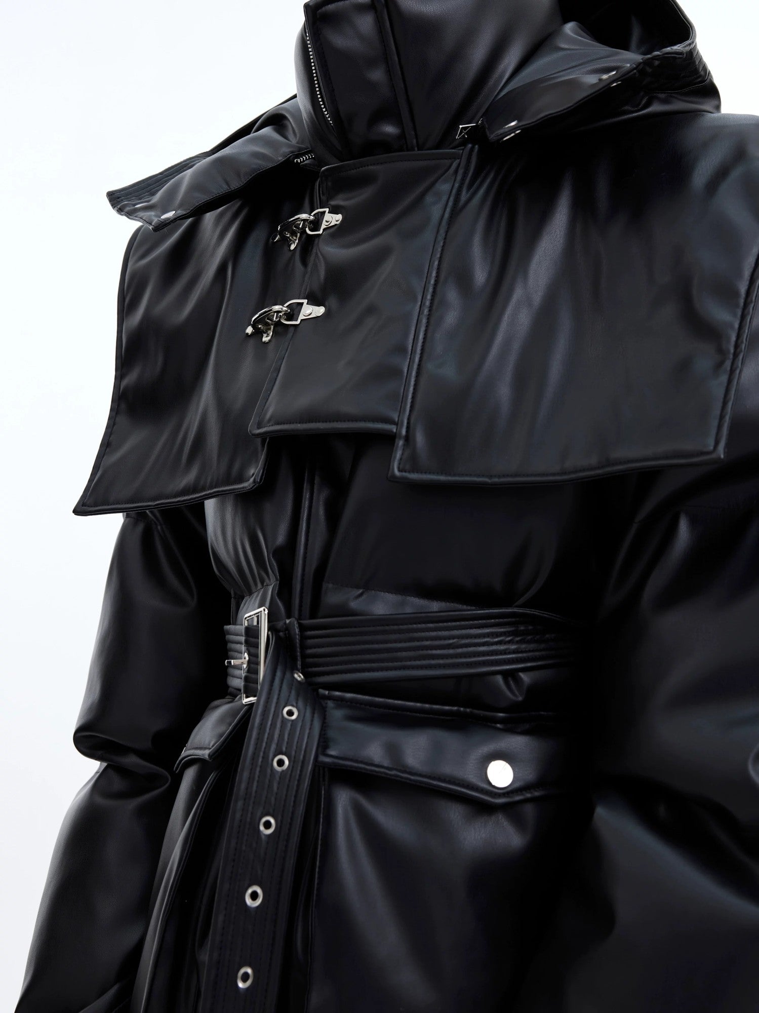 Front view of white futuristic deconstructed long padded jacket