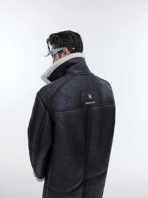 Close up of the deconstructed pleated stitching and shearling texture