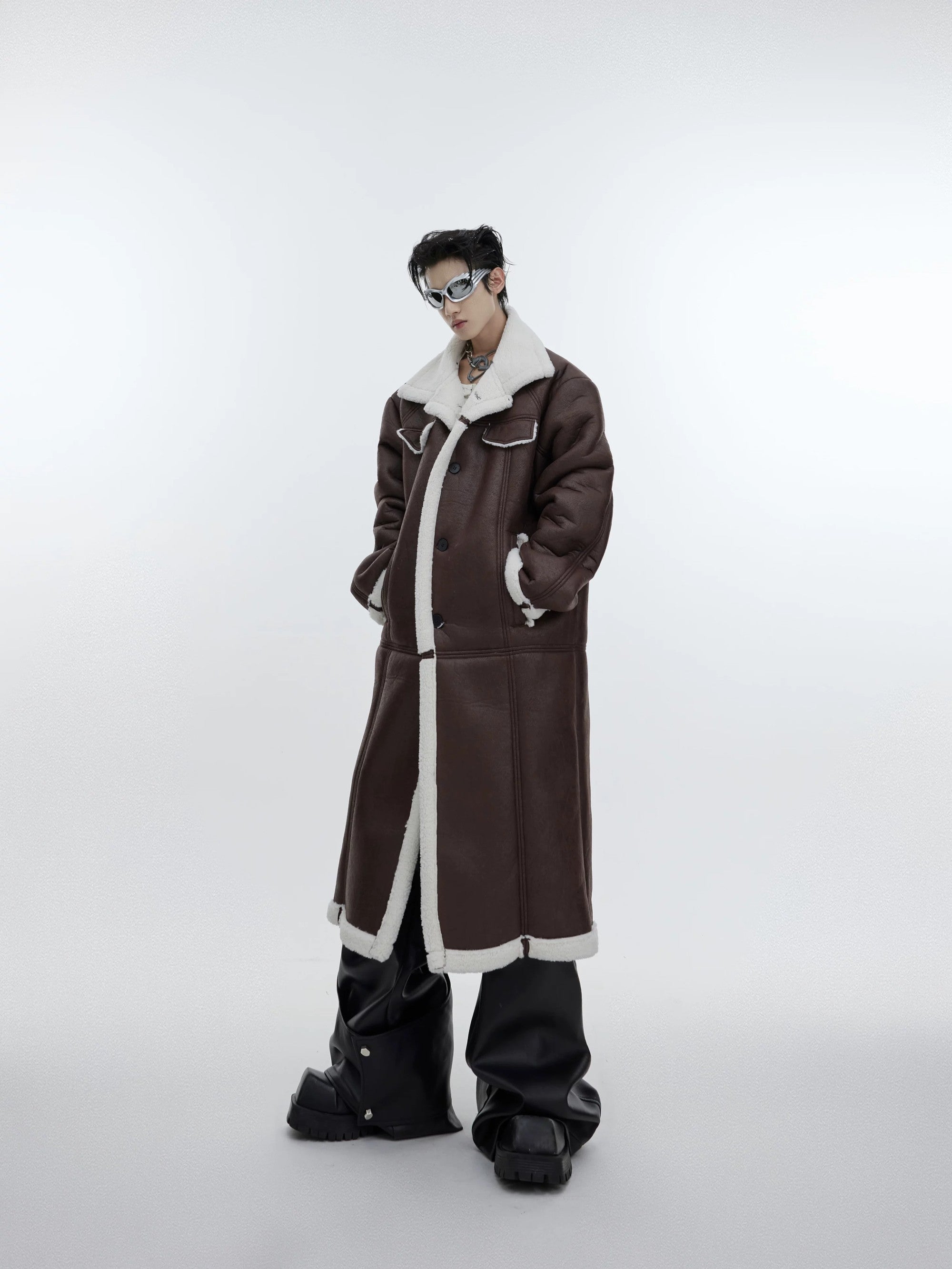Back view of the oversized long-line deconstructed winter coat