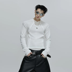 Close up of the signature metal logo on chest