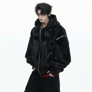 Close up of deconstructed armor shoulder design and faux fur texture