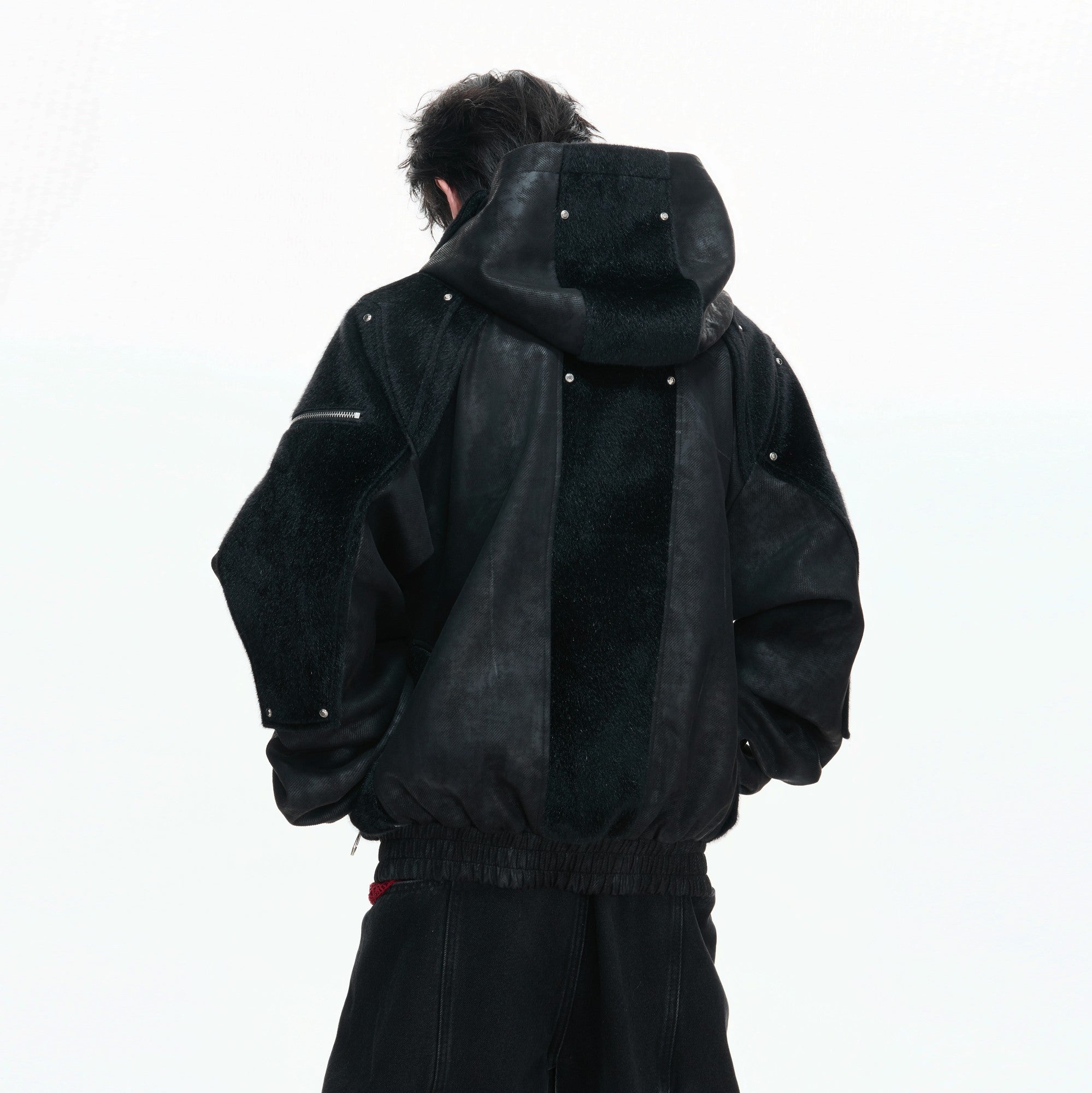 Back view of hooded faux leather jacket with matte finish