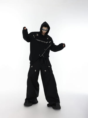 Lifestyle shot of a model wearing the deconstructed buckle hoodie in a city setting.